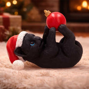 BLACK CAT IN SANTA HAT PLAYING WITH BAUBLE Figura